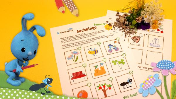 Kikaninchen mit einem Stift in der Hand daben liegt eine Druckvorlage für ein Sommer Bingo für Kinder 